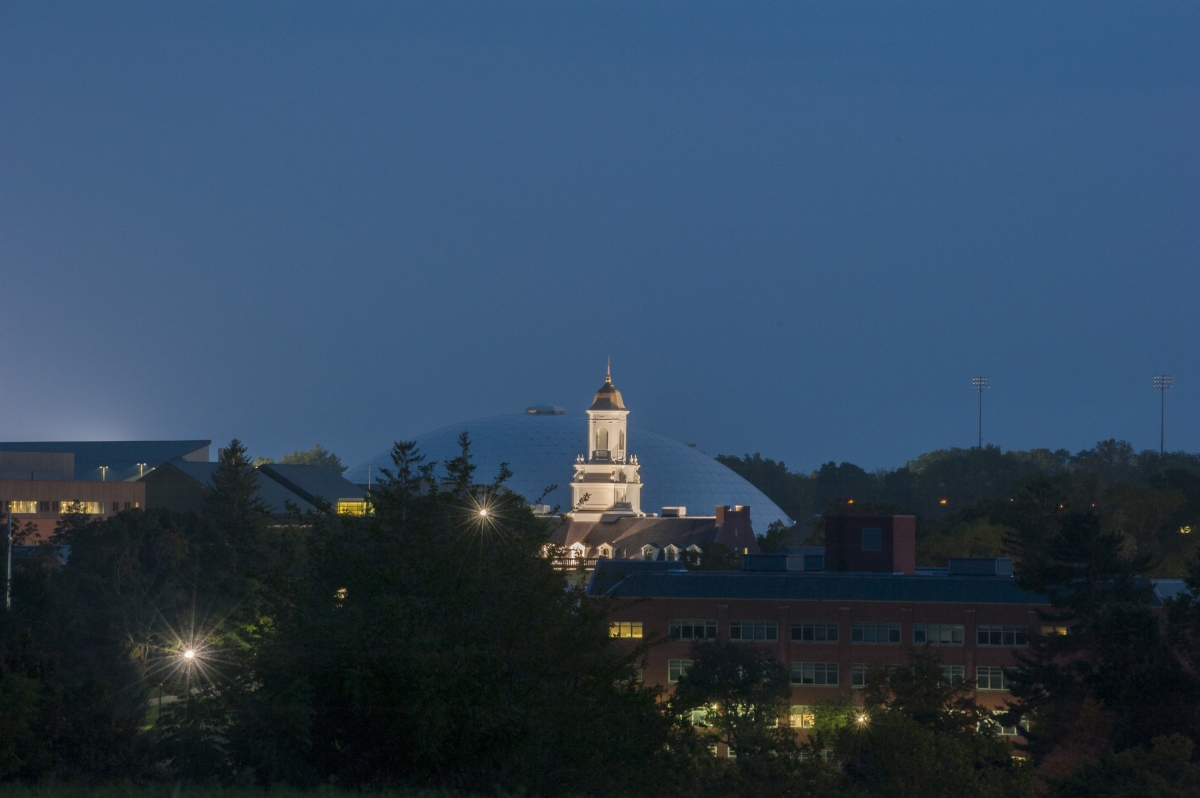 wilbur cross building at night from far away